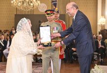 President Asif Ali Zardari conferring the award of Hilal-e- Imtiaz to Ms. Sadia Rashid