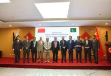 A group photo with H.E Yang Yundong on occasion of a seminar held at Chinese consulate.