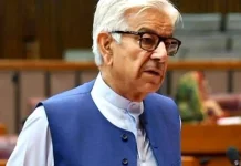 Asif urges PTI to change attitude for dialogue